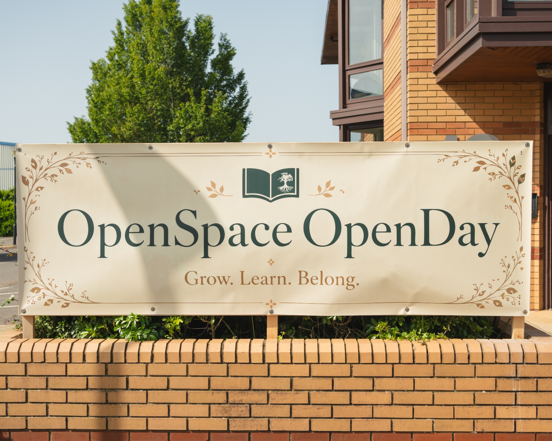 Exterior banner — Grow. Learn. Belong.